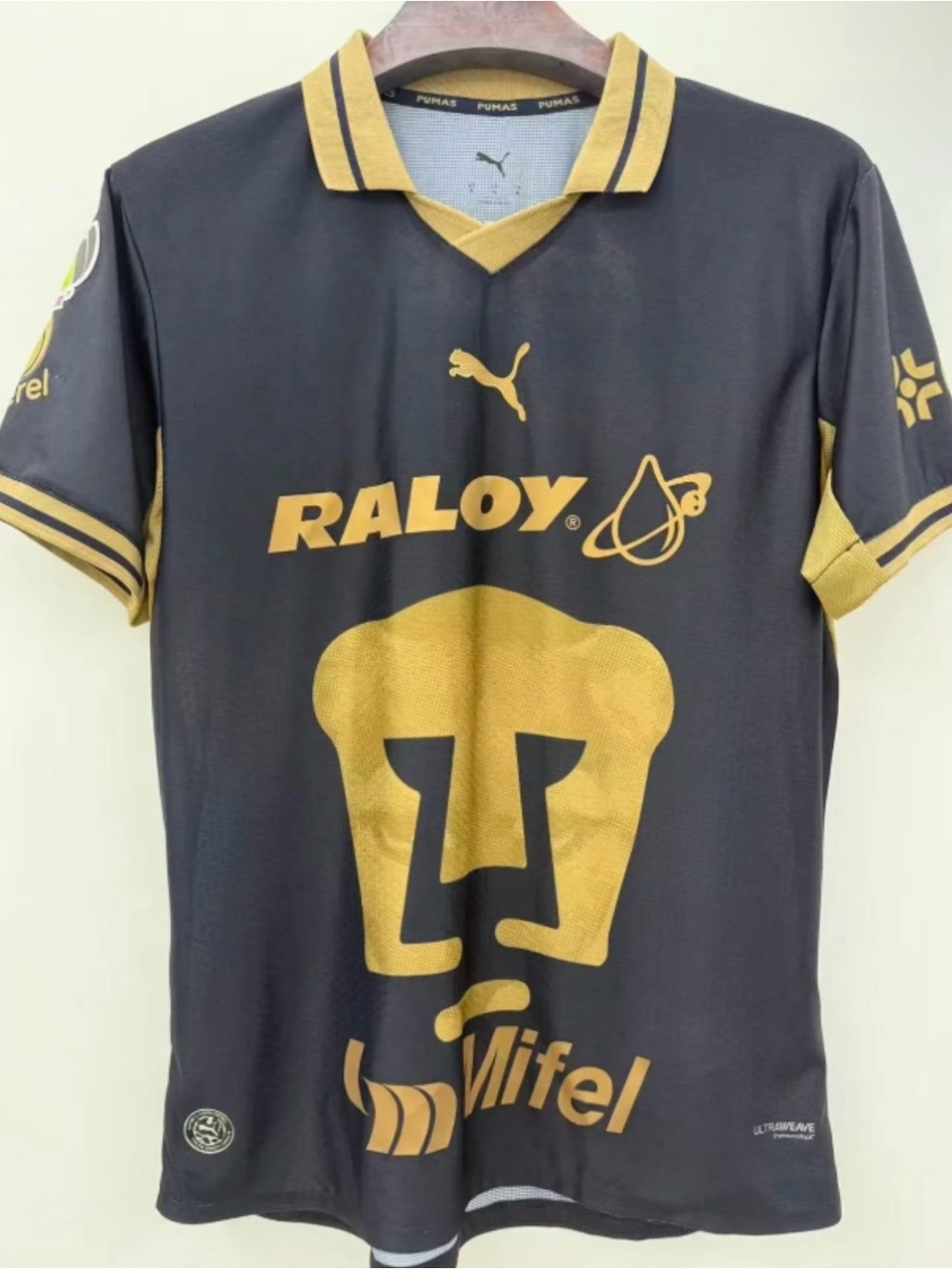 Puma Men's Black and Gold Short Sleeve Soccer Jersey